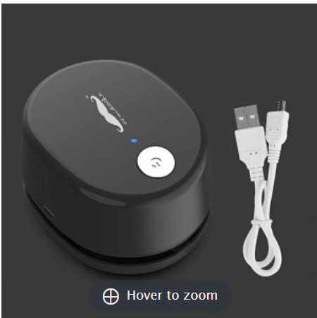 Mini desk dust vacuum